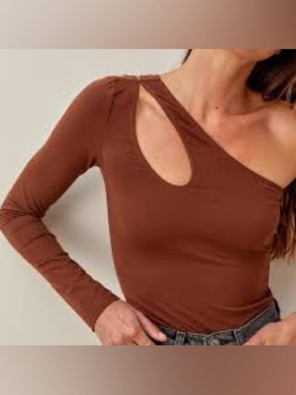 Reformation Asymmetrical Cutout Long-Sleeve Top in Brown medium